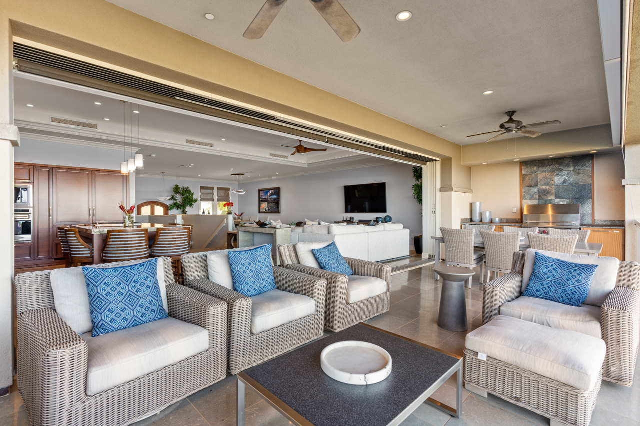 Wide lanai with panoramic ocean views: